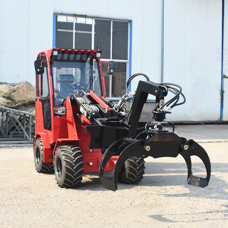 Chargeuse sur pneus télescopique à grappin à grumes